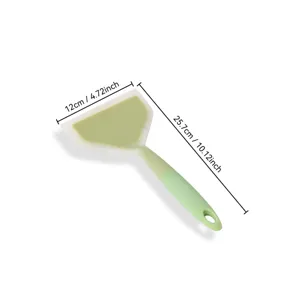 Silicone spatula for cooking with ergonomic handle and wide head, ideal for pancakes eggs steak.
