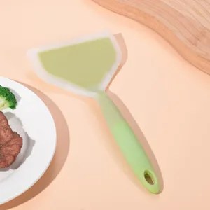 Detailed view of the dual-color silicone spatula, perfect for cooking, flipping pancakes and steaks.