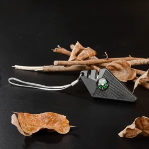 Compact mini outdoor portable knife sharpener with integrated compass for hiking detail