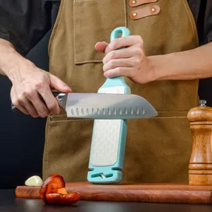 Portable diamond knife sharpener with double-sided sharpening stone for home kitchen use detail.