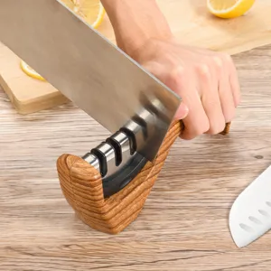 Portable wood grain knife sharpener detail, 3-slot manual kitchen sharpener tool for home use.