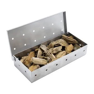 Stainless steel barbecue smoker box with hinged lid and ventilation holes for outdoor meat grilling.