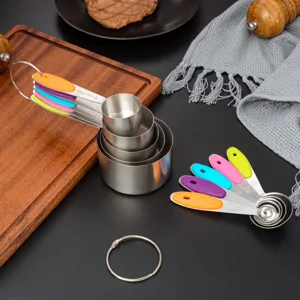 Stainless steel measuring cups and spoons set with colorful silicone handles for baking cooking.
