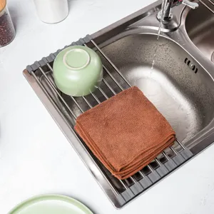 Roll-up dish drying rack for kitchen sink, stainless steel silicone collapsible drainer shelf.