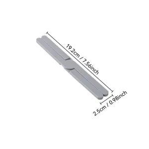 Foldable silicone heat insulation pad detail, grey portable kitchen trivet for hot pots and pans.