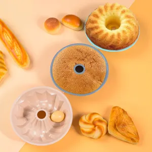 Round silicone cake mold featuring spiral design, flexible and durable for home baking pastries.