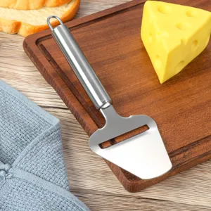 Stainless steel cheese plane detail shot showing the sharp blade and sturdy handle for easy slicing.
