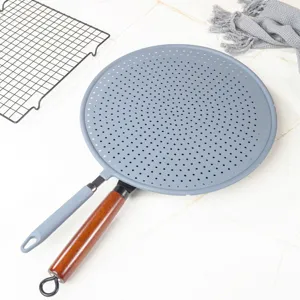 Cran anti-projections en silicone pour poele, grille de protection anti-huile de cuisine.
