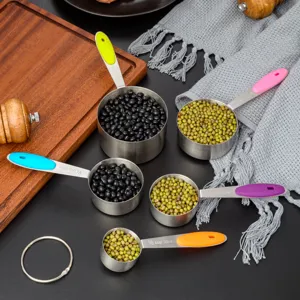 Stainless steel measuring spoons set with colorful silicone handles for baking kitchen tools.