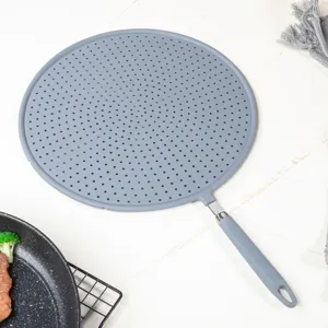 Écran anti-projections en silicone pour poêle, ustensile de cuisine résistant à la chaleur.