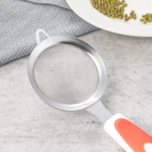 Stainless steel fine mesh strainer with comfortable ergonomic handle for baking flour and filtering.