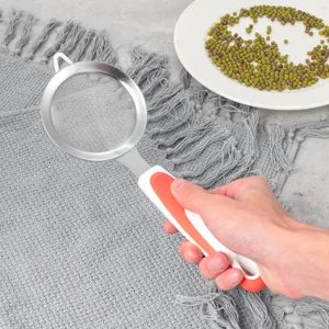 Stainless steel fine mesh strainer detail view with handle for baking flour and oil filtering.