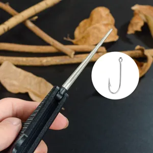 Detail view of portable mini diamond sharpening rod and fish hook file for outdoor fishing tools.