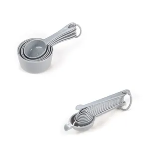 Set de cuillères à mesurer en plastique pour cuisine, cuillères empilables grises.