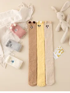 Cozy coral fleece long socks with cute animal embroidery and fluffy 3d ears for winter.