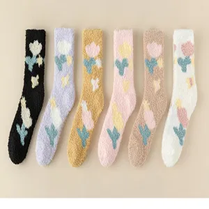 Fuzzy coral fleece tulip pattern socks, soft mid-tube home sleeping winter snow socks detail.