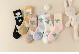Cozy winter coral fleece mid-tube socks with cute tulip pattern, soft and warm for home sleep.