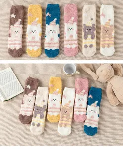 Cozy coral fleece winter sleeping socks with cute cartoon animal designs, thick warm snow socks.