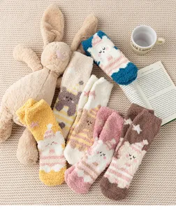 Cozy winter fuzzy coral fleece socks with cute cartoon animal design, thick and warm sleep socks.