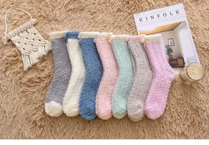 Cozy winter fuzzy coral fleece mid-calf socks for women, soft warm solid color sleep socks.