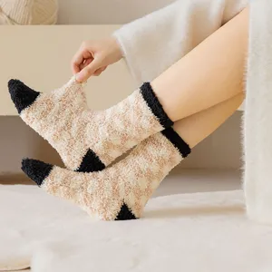 Cosy winter coral fleece sleep socks with plaid pattern and black toes for women warm.