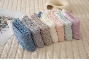 Thickened coral fleece cozy winter socks, soft warm solid color mid-tube sleep socks.