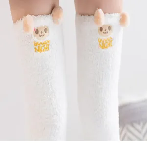 Fluffy coral fleece thick long sleep socks detail, cozy winter calf socks for women.