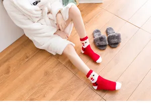 Christmas coral fleece socks, thick warm winter fuzzy sleep socks with cute Santa design.