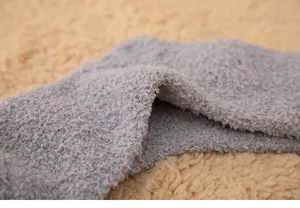 Winter dicke einfarbige Korallenfleece warme Schlaf Socken Detail Nahaufnahme Textur