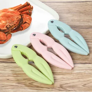 Outil de cuisine ouvre-noix pince a crabe en plastique lot de trois de couleurs.