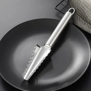 Desescamador de pescado de acero inoxidable con hoja dentada para cocina eficiente.