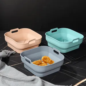 Detail view of foldable silicone air fryer basket set showing texture and flexible design.