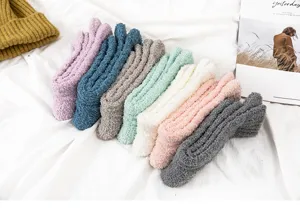 Cozy coral fleece plush sleep socks for women, thickened winter warm cable knit thermal socks.