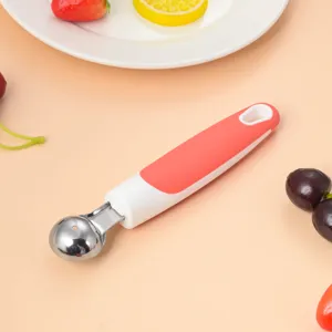 Stainless steel fruit melon baller spoon for kitchen, ice cream scoop with ergonomic handle.