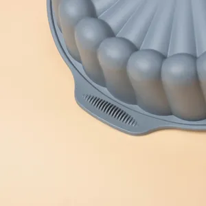 Close-up view of grey silicone cake mold detail, flexible baking pan texture design showcase.