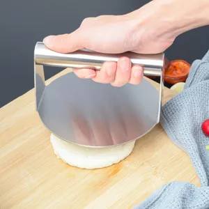 Stainless steel manual hamburger press detail view, great for kitchen baking and meat smash.