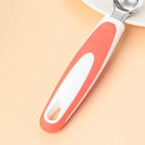 Stainless steel fruit melon baller scoop with ergonomic non-slip handle for kitchen cooking tools.