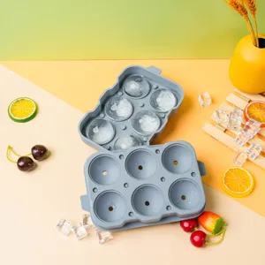 Silicone ice ball tray detail view showing durable 6 cavity mold for homemade round ice.