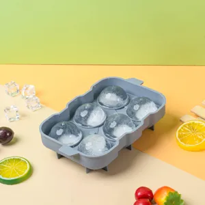 Grey silicone ice ball maker mold with round spheres for home kitchen cooling drinks