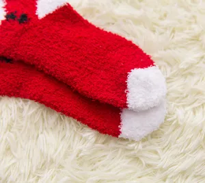 Winter coral fleece Christmas home sleep socks, thick cozy warm fuzzy mid tube socks detail.