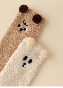 Cozy fuzzy coral fleece winter sleep socks with cute 3D bear ears and soft embroidery design.