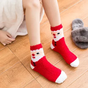 Cozy Christmas fuzzy socks, thick warm coral fleece winter sleep socks with cute Santa pattern.