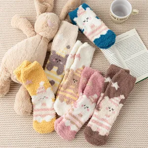 Cozy thick coral fleece fuzzy winter sleep socks with cute cartoon animal designs for women.