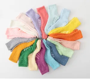 Cozy winter coral fleece socks with anti-slip grip soles, thick and warm for home sleep.