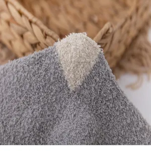 Cozy coral fleece sock detail showing soft fabric texture and warm home style design.