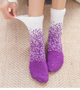 Cozy coral fleece plush sleep sock detail view showing thick gradient texture and warmth.