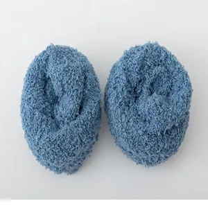 Coral fleece winter socks detail view showing soft blue fuzzy texture for cozy home sleep wear.