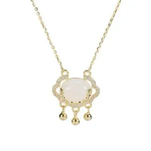 Exquisite gold-plated lock pendant necklace with sparkling rhinestones and white jade bead.
