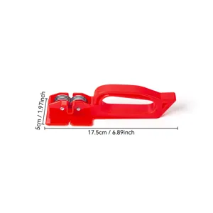 Red manual kitchen knife sharpener detail view showing compact size and dual slots.