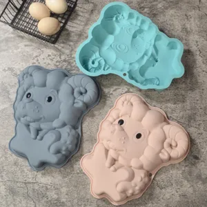 Silicone cake mold baking pan detail view showing cute animal shaped molds in multi colors.